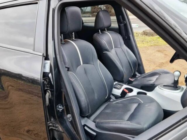 Черный Ниссан Жук, объемом двигателя 1.6 л и пробегом 76 тыс. км за 8000 $, фото 9 на Automoto.ua