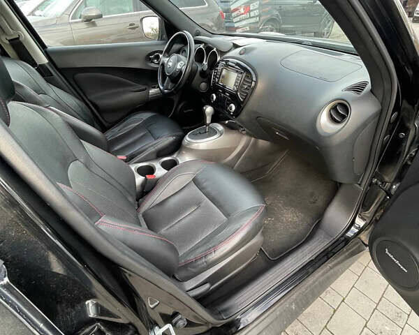 Черный Ниссан Жук, объемом двигателя 1.6 л и пробегом 120 тыс. км за 10900 $, фото 26 на Automoto.ua