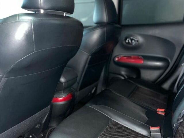 Чорний Ніссан Жук, об'ємом двигуна 1.6 л та пробігом 120 тис. км за 12500 $, фото 5 на Automoto.ua