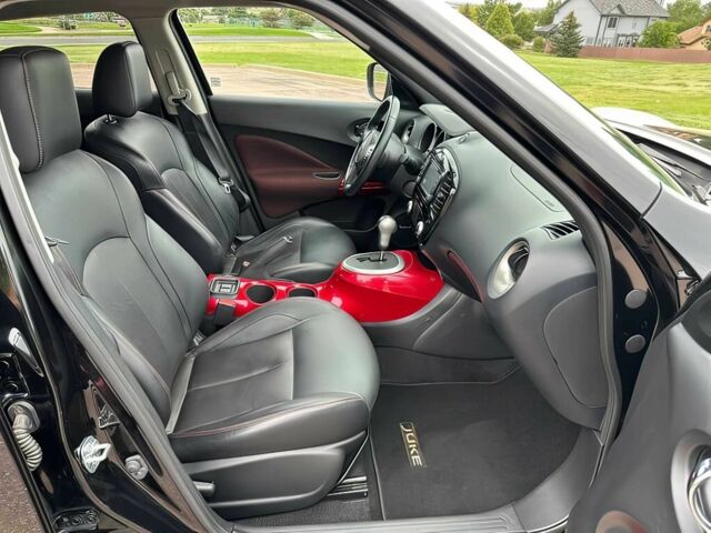 Черный Ниссан Жук, объемом двигателя 1.6 л и пробегом 79 тыс. км за 6200 $, фото 11 на Automoto.ua