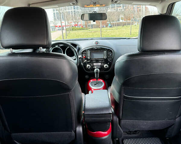 Черный Ниссан Жук, объемом двигателя 1.62 л и пробегом 70 тыс. км за 12500 $, фото 19 на Automoto.ua