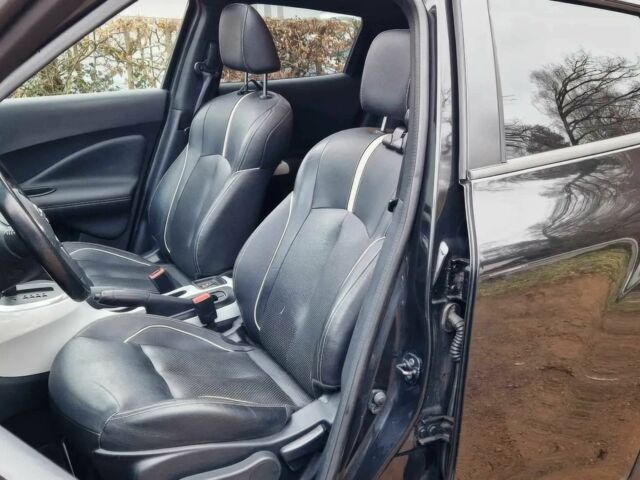 Черный Ниссан Жук, объемом двигателя 1.6 л и пробегом 76 тыс. км за 8000 $, фото 8 на Automoto.ua