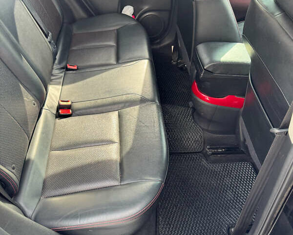 Черный Ниссан Жук, объемом двигателя 1.62 л и пробегом 70 тыс. км за 12500 $, фото 10 на Automoto.ua