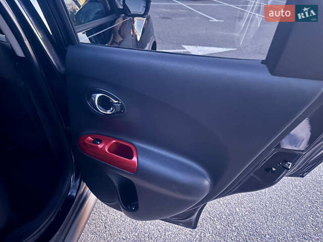 Черный Ниссан Жук, объемом двигателя 1.6 л и пробегом 111 тыс. км за 12800 $, фото 18 на Automoto.ua