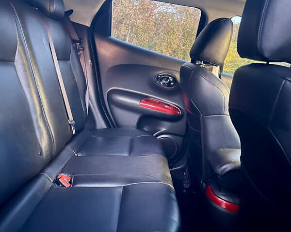 Черный Ниссан Жук, объемом двигателя 1.6 л и пробегом 111 тыс. км за 12800 $, фото 17 на Automoto.ua