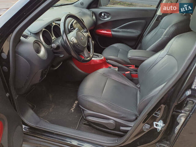 Черный Ниссан Жук, объемом двигателя 1.6 л и пробегом 111 тыс. км за 12500 $, фото 14 на Automoto.ua