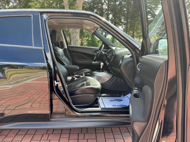 Черный Ниссан Жук, объемом двигателя 1.6 л и пробегом 80 тыс. км за 5400 $, фото 8 на Automoto.ua