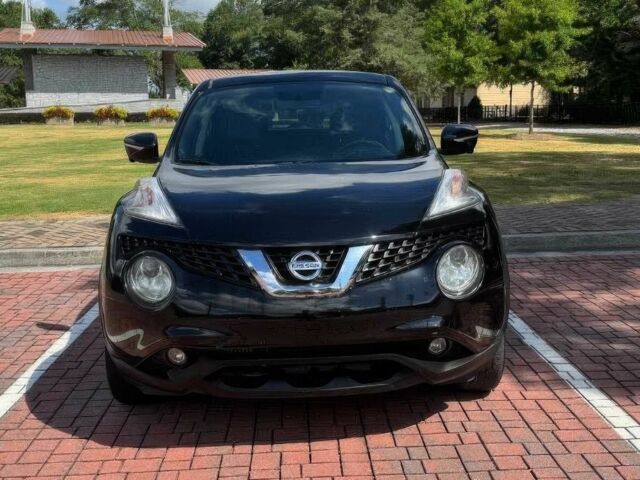 Черный Ниссан Жук, объемом двигателя 1.6 л и пробегом 73 тыс. км за 6500 $, фото 1 на Automoto.ua