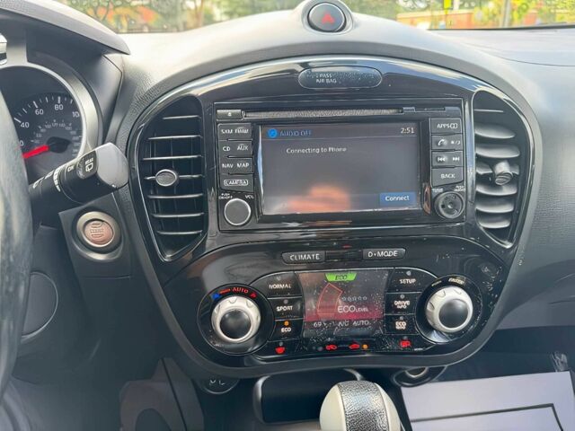 Черный Ниссан Жук, объемом двигателя 1.6 л и пробегом 80 тыс. км за 5400 $, фото 7 на Automoto.ua