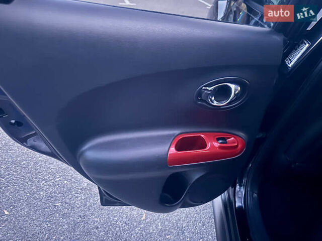 Черный Ниссан Жук, объемом двигателя 1.6 л и пробегом 111 тыс. км за 12800 $, фото 20 на Automoto.ua