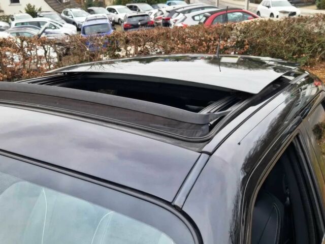 Черный Ниссан Жук, объемом двигателя 1.6 л и пробегом 76 тыс. км за 8000 $, фото 11 на Automoto.ua