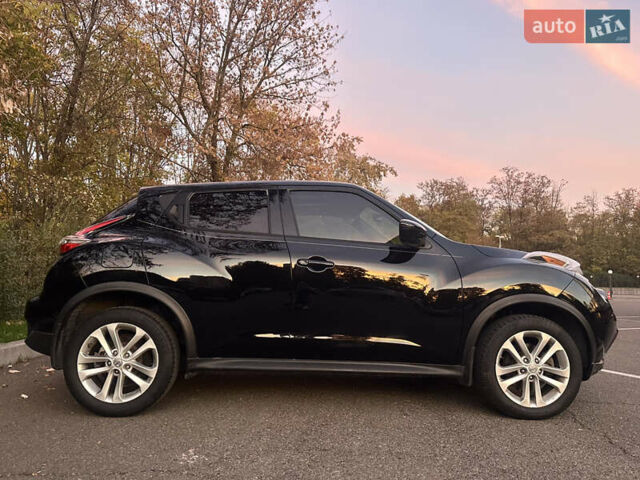 Черный Ниссан Жук, объемом двигателя 1.6 л и пробегом 111 тыс. км за 12800 $, фото 3 на Automoto.ua