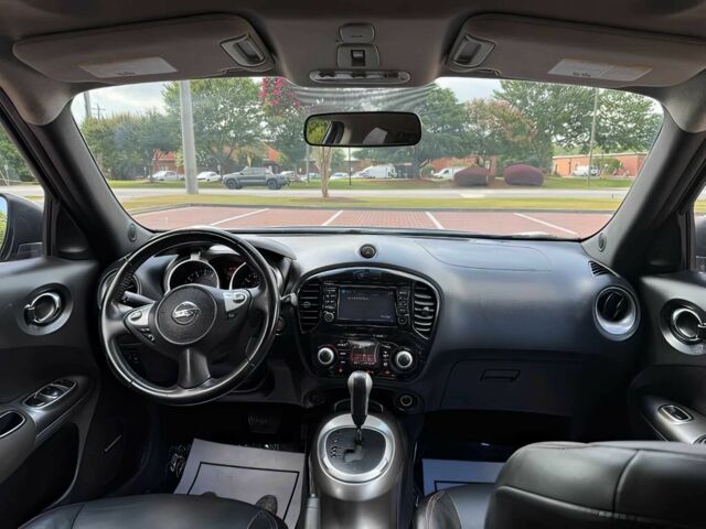 Черный Ниссан Жук, объемом двигателя 1.6 л и пробегом 80 тыс. км за 5400 $, фото 6 на Automoto.ua