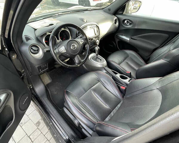 Черный Ниссан Жук, объемом двигателя 1.6 л и пробегом 120 тыс. км за 10900 $, фото 8 на Automoto.ua