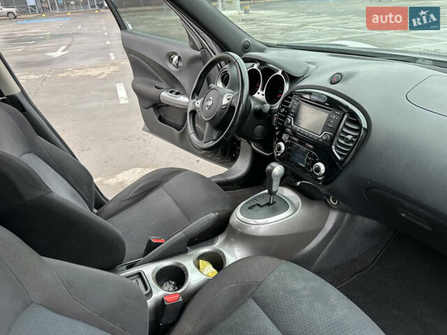 Черный Ниссан Жук, объемом двигателя 1.6 л и пробегом 150 тыс. км за 8300 $, фото 26 на Automoto.ua