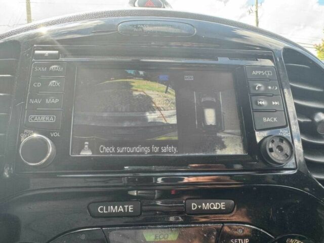 Черный Ниссан Жук, объемом двигателя 1.6 л и пробегом 73 тыс. км за 6500 $, фото 9 на Automoto.ua