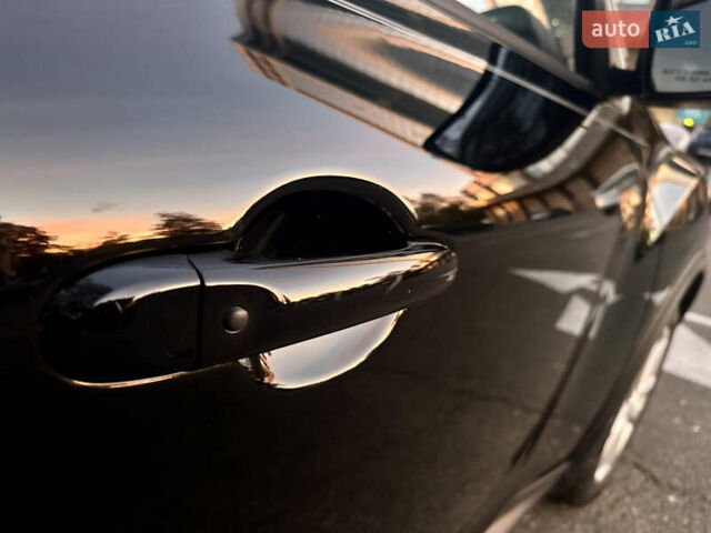 Черный Ниссан Жук, объемом двигателя 1.6 л и пробегом 111 тыс. км за 12800 $, фото 5 на Automoto.ua