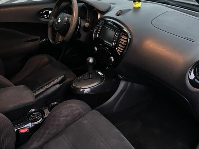 Черный Ниссан Жук, объемом двигателя 1.6 л и пробегом 137 тыс. км за 12500 $, фото 11 на Automoto.ua