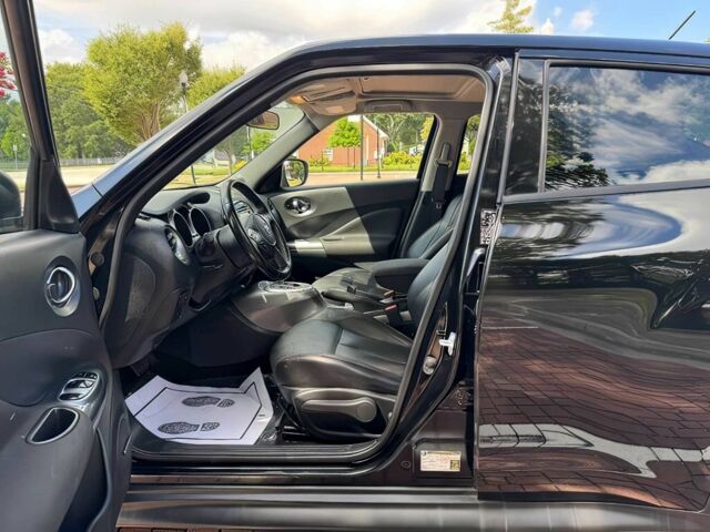 Черный Ниссан Жук, объемом двигателя 1.6 л и пробегом 80 тыс. км за 5400 $, фото 5 на Automoto.ua