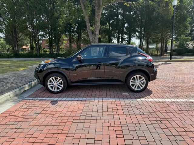 Черный Ниссан Жук, объемом двигателя 1.6 л и пробегом 80 тыс. км за 5400 $, фото 2 на Automoto.ua