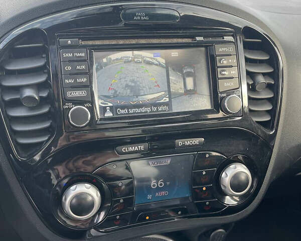 Черный Ниссан Жук, объемом двигателя 1.6 л и пробегом 120 тыс. км за 10900 $, фото 18 на Automoto.ua