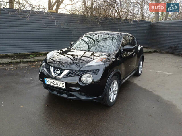 Черный Ниссан Жук, объемом двигателя 1.6 л и пробегом 111 тыс. км за 12500 $, фото 13 на Automoto.ua