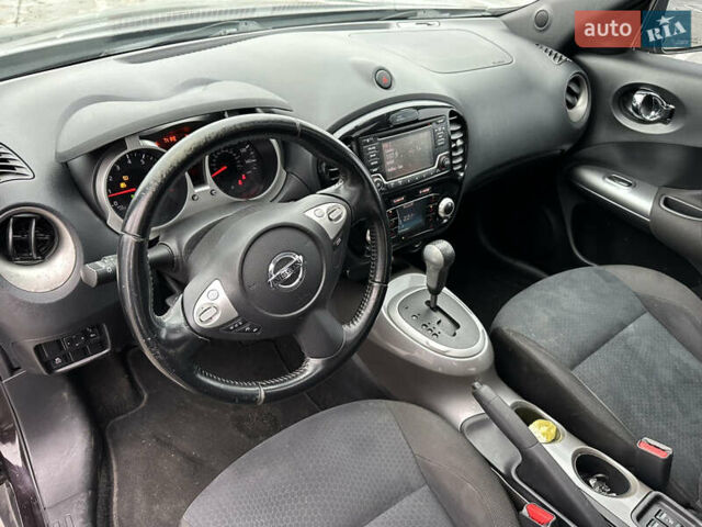 Черный Ниссан Жук, объемом двигателя 1.6 л и пробегом 150 тыс. км за 8300 $, фото 19 на Automoto.ua