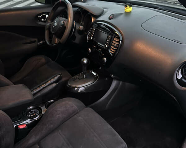 Черный Ниссан Жук, объемом двигателя 1.6 л и пробегом 135 тыс. км за 12300 $, фото 6 на Automoto.ua