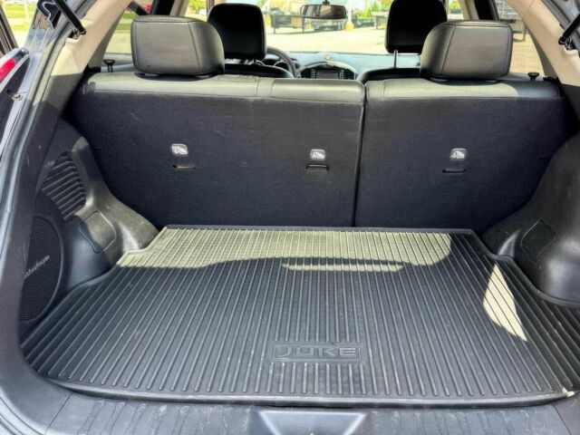 Черный Ниссан Жук, объемом двигателя 1.6 л и пробегом 74 тыс. км за 6000 $, фото 9 на Automoto.ua