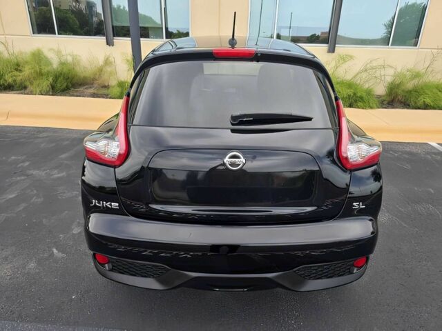 Черный Ниссан Жук, объемом двигателя 1.6 л и пробегом 70 тыс. км за 10000 $, фото 4 на Automoto.ua