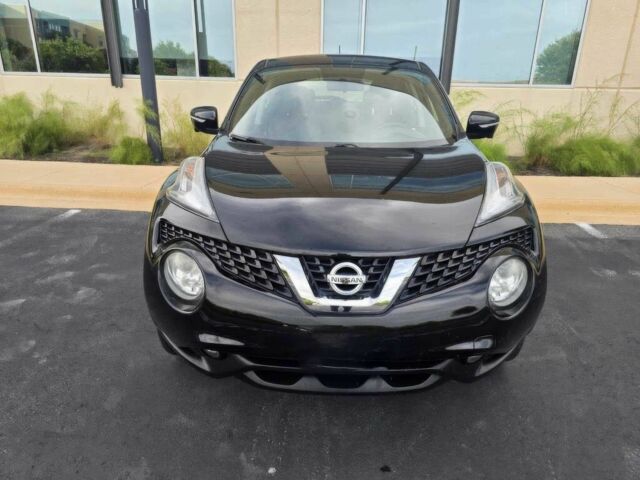 Черный Ниссан Жук, объемом двигателя 1.6 л и пробегом 75 тыс. км за 3900 $, фото 1 на Automoto.ua