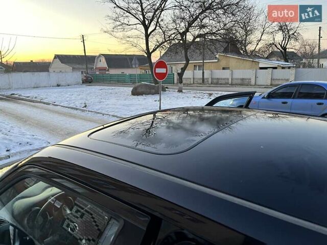 Черный Ниссан Жук, объемом двигателя 1.62 л и пробегом 119 тыс. км за 13100 $, фото 1 на Automoto.ua