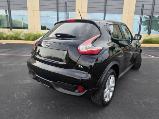 Черный Ниссан Жук, объемом двигателя 1.6 л и пробегом 70 тыс. км за 4800 $, фото 5 на Automoto.ua