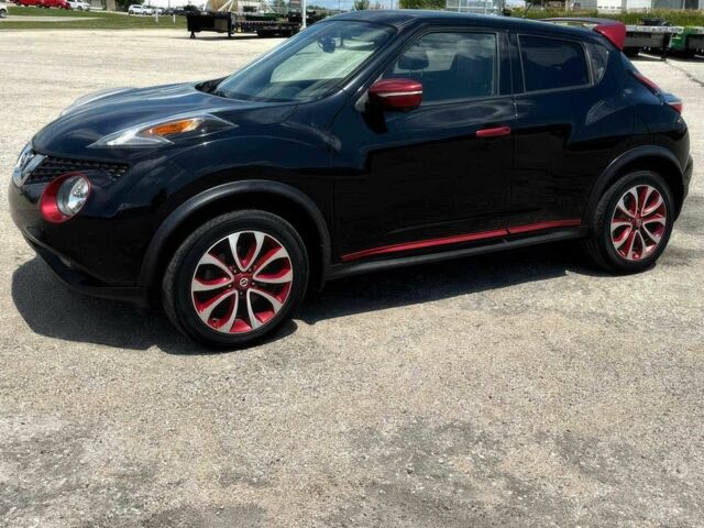 Черный Ниссан Жук, объемом двигателя 1.6 л и пробегом 74 тыс. км за 6000 $, фото 1 на Automoto.ua