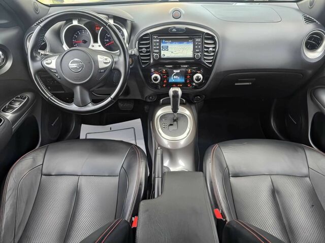 Черный Ниссан Жук, объемом двигателя 1.6 л и пробегом 70 тыс. км за 10000 $, фото 7 на Automoto.ua