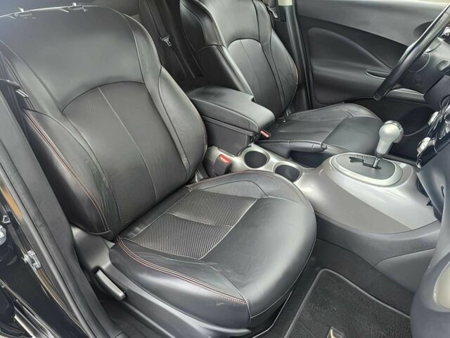 Черный Ниссан Жук, объемом двигателя 1.6 л и пробегом 70 тыс. км за 10000 $, фото 10 на Automoto.ua