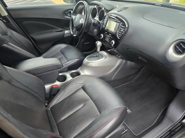 Черный Ниссан Жук, объемом двигателя 1.6 л и пробегом 70 тыс. км за 4800 $, фото 6 на Automoto.ua