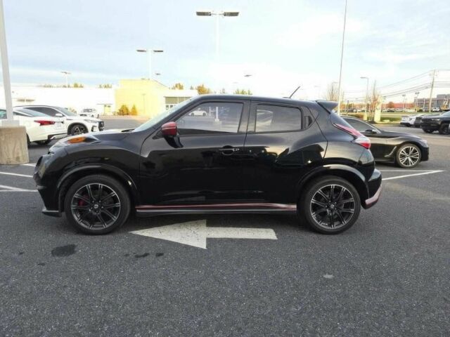 Черный Ниссан Жук, объемом двигателя 1.6 л и пробегом 80 тыс. км за 9000 $, фото 6 на Automoto.ua