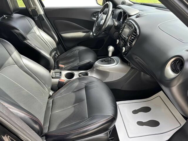 Чорний Ніссан Жук, об'ємом двигуна 1.6 л та пробігом 75 тис. км за 6000 $, фото 7 на Automoto.ua