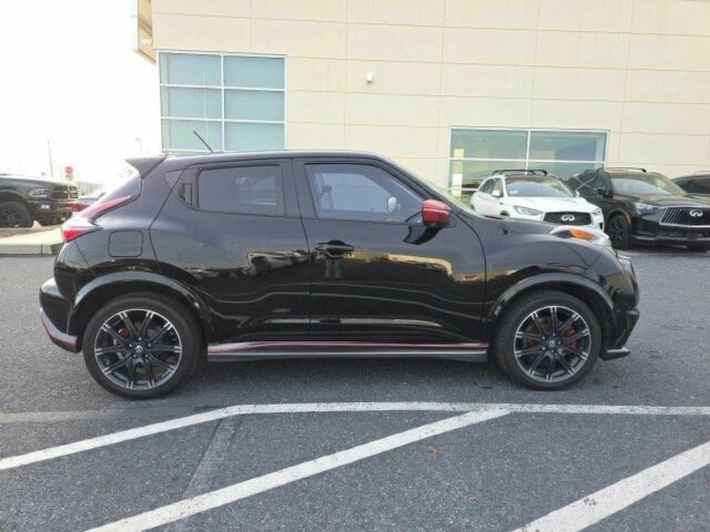 Черный Ниссан Жук, объемом двигателя 1.6 л и пробегом 80 тыс. км за 9000 $, фото 3 на Automoto.ua