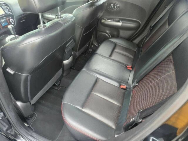 Черный Ниссан Жук, объемом двигателя 1.6 л и пробегом 75 тыс. км за 3900 $, фото 12 на Automoto.ua