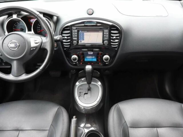 Черный Ниссан Жук, объемом двигателя 1.6 л и пробегом 71 тыс. км за 8000 $, фото 5 на Automoto.ua