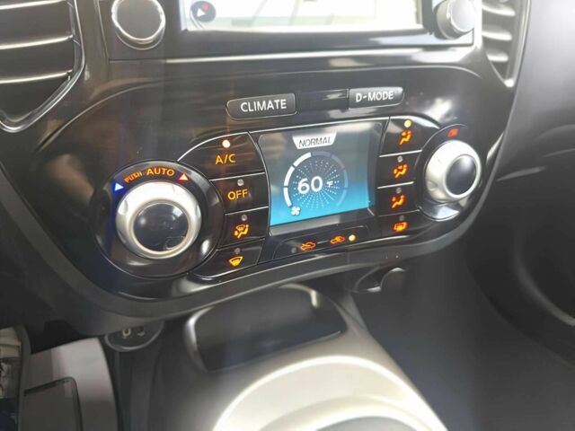 Черный Ниссан Жук, объемом двигателя 1.6 л и пробегом 70 тыс. км за 10000 $, фото 9 на Automoto.ua