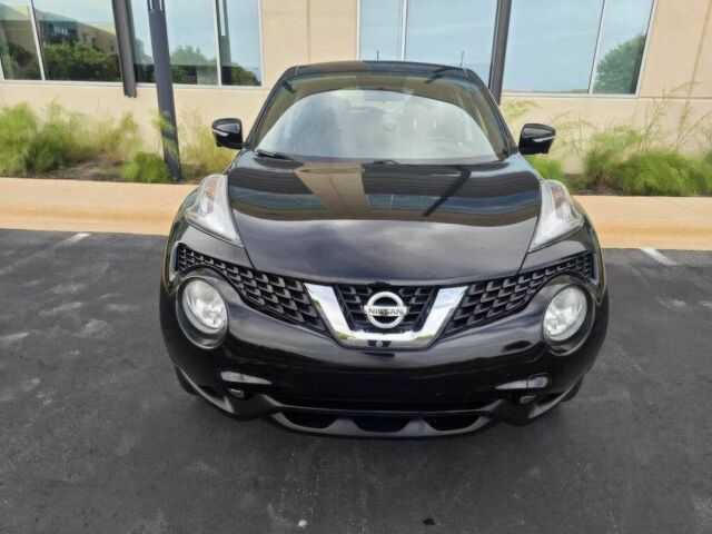 Черный Ниссан Жук, объемом двигателя 1.6 л и пробегом 70 тыс. км за 4800 $, фото 1 на Automoto.ua