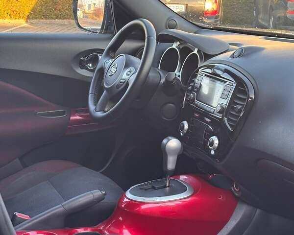 Чорний Ніссан Жук, об'ємом двигуна 1.6 л та пробігом 219 тис. км за 9999 $, фото 10 на Automoto.ua