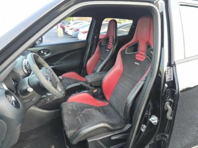 Черный Ниссан Жук, объемом двигателя 1.6 л и пробегом 80 тыс. км за 9000 $, фото 7 на Automoto.ua