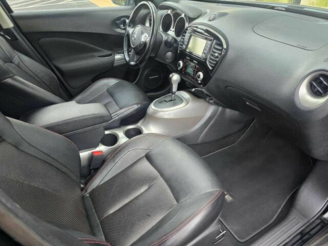 Черный Ниссан Жук, объемом двигателя 1.6 л и пробегом 75 тыс. км за 3900 $, фото 7 на Automoto.ua