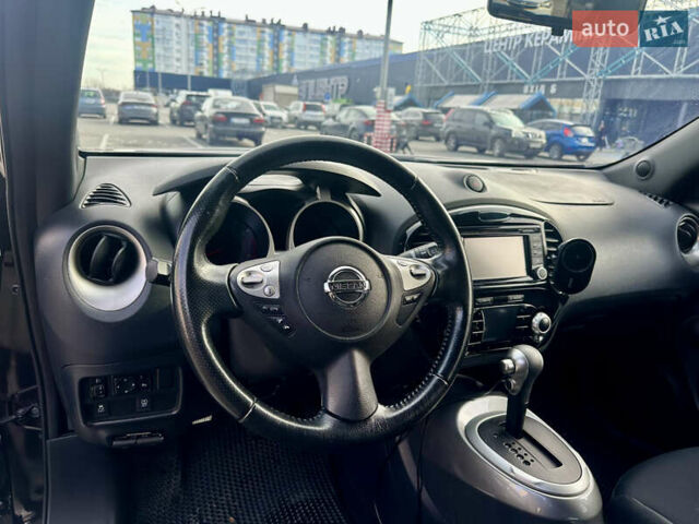 Черный Ниссан Жук, объемом двигателя 1.6 л и пробегом 80 тыс. км за 12200 $, фото 7 на Automoto.ua