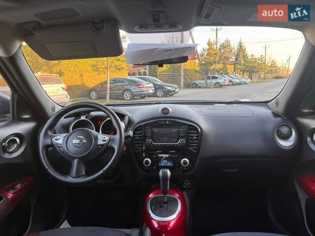 Чорний Ніссан Жук, об'ємом двигуна 1.6 л та пробігом 219 тис. км за 9999 $, фото 12 на Automoto.ua
