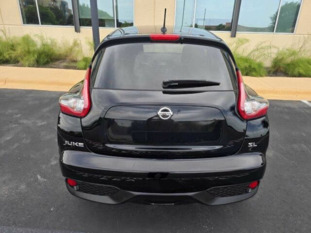 Черный Ниссан Жук, объемом двигателя 1.6 л и пробегом 70 тыс. км за 4800 $, фото 4 на Automoto.ua